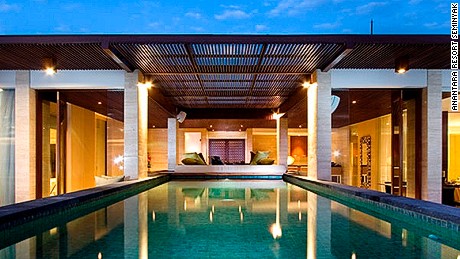The penthouse suite at Anantara Resort Seminyak puts you at eye-level with the coconut trees.