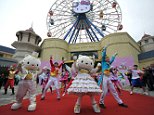 Mandatory Credit: Photo by Imaginechina/REX (4272185c) Entertainers dressed in Hello Kitty costumes Hello Kitty theme park inauguration ceremony, Huzhou city, Zhejiang province, China - 28 Nov 2014 The inauguration ceremony of a new Hello Kitty theme park was held Friday (28 November 2014) in Anji county, in east China?s Zhejiang province. The theme park is set to delight Chinese fans when it opens its doors at the beginning of 2015. Japanese company Sanrio, who created Hello Kitty in 1974, have joined with entertainment design firm Hettema Group from California, to bring their new park to life. Sanrio already owns two theme parks in Japan - Puroland and Harmonyland - which attract millions of visitors every year. With both parks exceeding expectations, the new theme park in China is likely to attract over a million visitors each year.