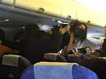 Pic shows: An angry mum got into a punch up with two other women on an Air China flight.nnAn angry mum got into a punch up with two other women on an Air China flight when they complained her baby was making too much noise.nnChan Juan Sung, 27, was flying from south-western China¿s Chongqing city to Hong Kong when her baby began crying and woke the two women behind her.nnPassenger Xiong Wan, 45, said: I was sitting right next to them when they started telling the woman to shut the baby up.nnShe started shouting back at them and before I knew what was happening she leant over the seat and punched one of them.nnThey then started hitting her and all hell broke loose.nnThey were fighting, the baby was now screaming and other passengers were shouting.nnIt was like some bizarre film.nnThe brawling women were eventually separated by cabin crew and taken in for questioning when the flight reached the eastern city of Hong Kong.nnAir China spokesman Daio Weimin said: Pa