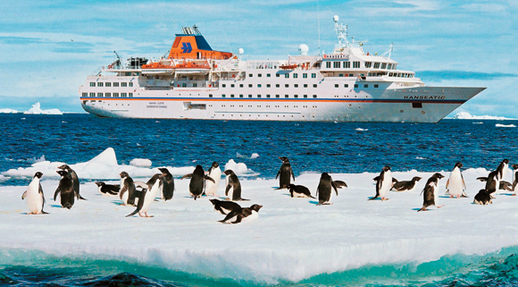 Experts cite a growing interest in cruises that call at more exotic ports. Pictured in Antarctica is Hapag-Lloyd Cruises’ Hanseatic, which will visit southeastern Siberia twice in 2014.