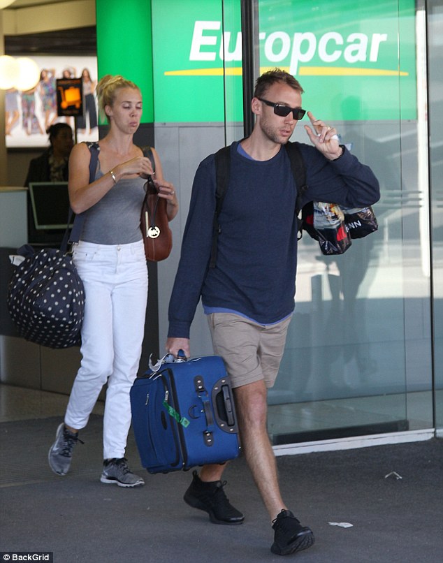 Honeymoon over: Lisa Curry and Grant Kenny's daughter Morgan Kenny jetted back into Brisbane on Thursday with her new husband, Ryan Gruel, following their honeymoon to start their new life together