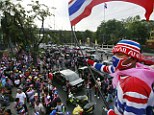 Ongoing protests: Anti-government demonstrators block the entrance of the Ministry of Foreign Affairs in Bangkok today