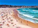 Surf's up! Bondi Beach is packed with tiny holidaymakers in the video, which took one week to film