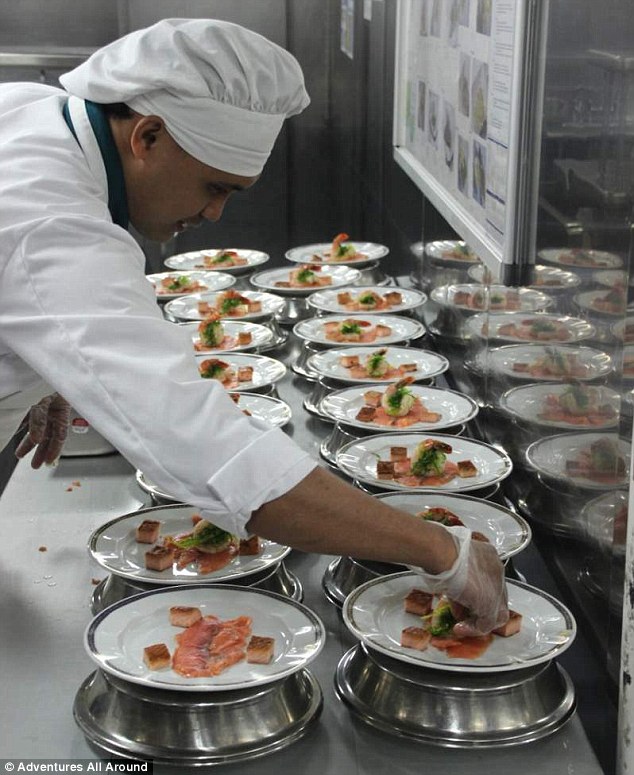 'You eat like a crazy pig - you go insane,' Ms Woods said of the cruise ship experience. She was allowed into the kitchens of MS Oosterdam to see the fine food being prepared