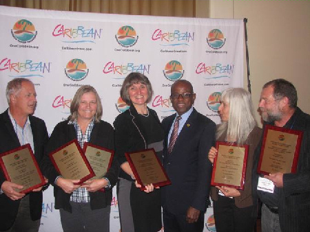 CTO Award winners from left: Jim Byers, Jo Matyas, Ilona Kauremszky, (CTO SG) Hugh Riley, Sharon Matthews-Stevens Mark Stevens. Missing from photo are Melanie Reffes and Hélène Clément