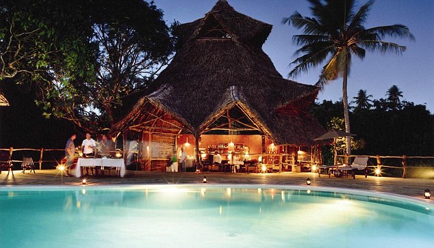 Wedding toast: Enjoy a sundowner at the poolside bar at Fundu Lagoon in Tanzania