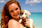Tourists looking for canine companionship will find paradise in Providenciales. Photo / Potcake Place