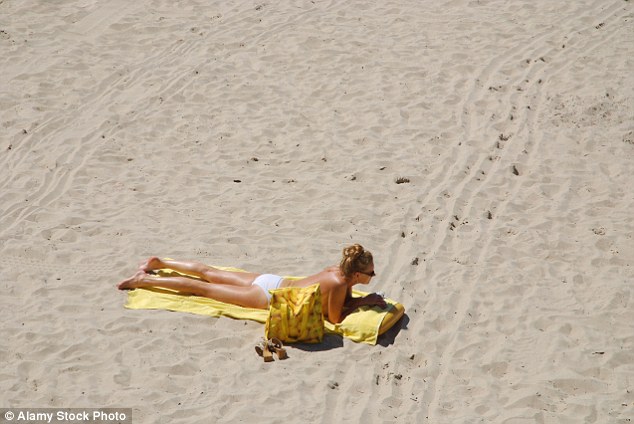 One woman said topless sunbathers on a beach that passengers visited should be banned, as her husband had spent all holiday staring at other women