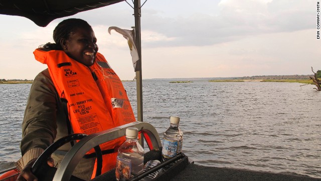 Connie, a guide at Chobe Game Lodge, behind the wheel of their new electric boat on the Chobe River in Botswana. The lodge has an all-female guiding team.