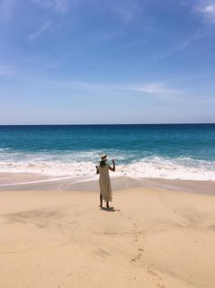 Rosie Huntington-Whiteley at the beach