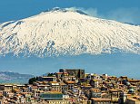 DYMC9H Hill town with backdrop of snowy volcano Mount Etna; Gangi was a common Mafia last name; Gangi, Palermo Province, Sicily, Ital