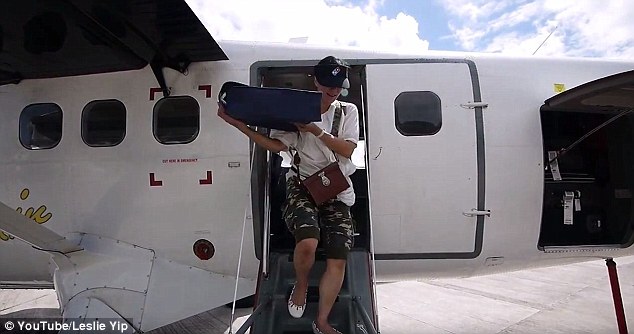This image shows the delivery girl disembarking - the pizza safe and sound after a routine flight 