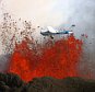 MAIN PHOTOT: A daring pilot flies his plane over a volcano as red-hot lava bursts into the sky.  The scorching lava, which is 850 degrees Celsius hot, erupts in the air up to heights of almost 200 feet.On board the little blue and white plane are sightseers, who get an up close view of the spectacular volcano, as they were just 300 metres away.  These stunning pictures were taken by photographer Baldur Sveinsson, who was in another plane flying around the volcano.  SEE OUR COPY FOR DETAILS.Pictured:  The plane flying over the volcano as red-hot lava bursts into the sky.Please byline: Baldur Sveinsson/Solent News© Baldur Sveinsson/Solent News  Photo AgencyUK +44 (0) 2380 458800
