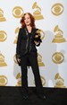 Bonnie Raitt - Bonnie Raitt poses with her trophy for Best Americana album for 'Slipstream' in the press room at the Staples Center during the 55th Grammy Awards in Los Angeles, California, February 10, 2013.