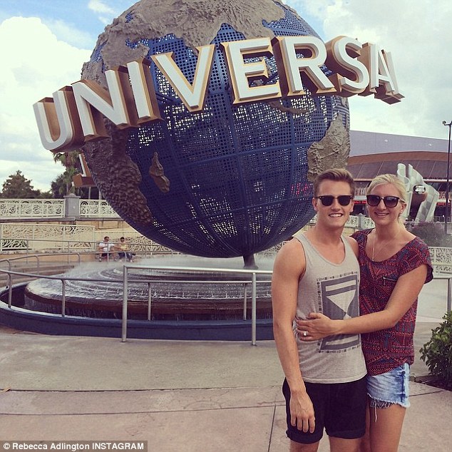 Twos company: Rebecca and Harry Needs stand outside the Universal Studios sign in Orlando, Florida