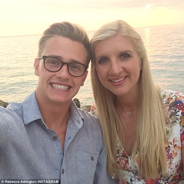 Soaking up some sun in Italy the newly weds pose in front of the sea for a snap for Instagram