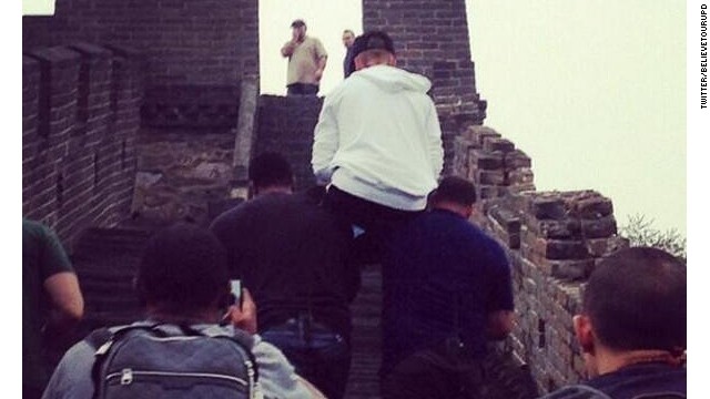 A widely distributed photo of the seemingly able-bodied Canadian pop star hoisted on the shoulders of his lackeys at the iconic site invoked mockery worldwide. 