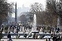 People walk in the Tuileries Garden in central Paris during a warm and sunny winter day March 10, 2014.  REUTERS/Charles Platiau  (FRANCE - Tags: TRAVEL CITYSCAPE ENVIRONMENT)
