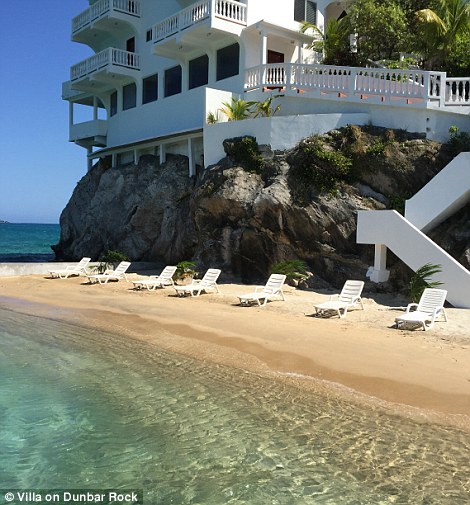 Forget battling with other holidaymakers for space on the beach, the rock villa comes with its own private stretch of golden sand