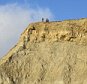 BNPS.co.uk (01202 558833)Pic: BNPSThree men sit on the cliff edge on West Cliffs, Wesy Bay, Dorset.As the second series of hugely popular drama Broadchurch starts, fans are being warned not to risk lives by going to the edge of dangerous and unstable cliffs.The cliffs at West Bay in Dorset, where the ITV series is set, are not safe and covered in warning signs but people are continuing to take reckless risks.Pictures have now emerged of three people sitting on the edge of West Cliff and Bridport and West Bay Coastguard are concerned people could fall or cause a rockslide risking lives on the beach below.
