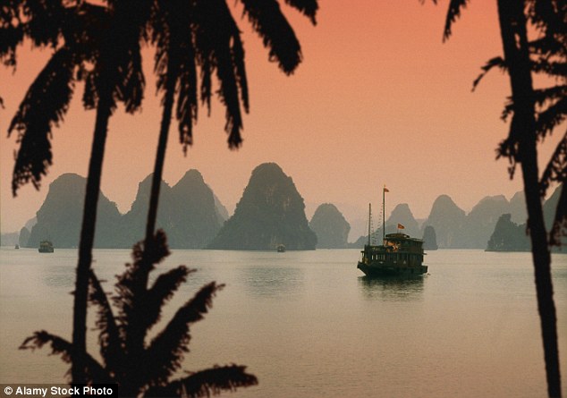Vietnam is known for the emerald waters and limestone towers of Ha Long Bay, a popular stop on river cruises (pictured)