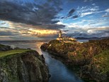 Moody atmosphere: The photographer captures the sun setting above Fanad Head Lighthouse in County Donegal