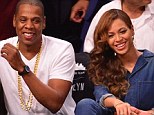 New club: Jay Z - pictured with Beyonce - is opening a new branch of his sports bar at Atlanta airport
