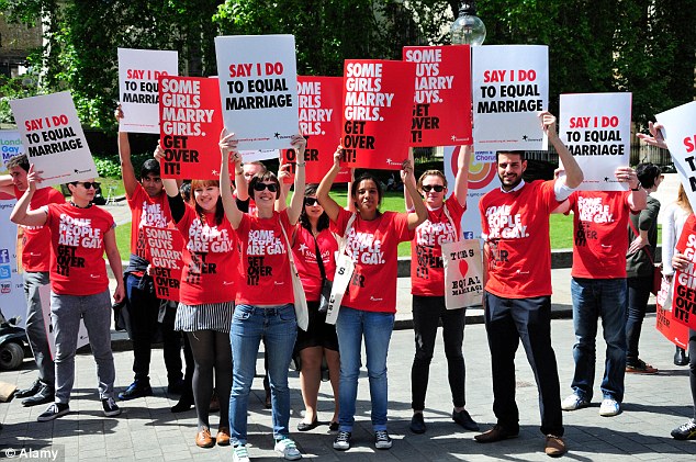 In June 2013, UK same-sex marriage supporters marched for equality outside the House of Lords