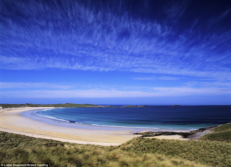 Tropical colours in May at the crescent-shaped Feall Beach on the Island of Coll, in the Inner Hebrides of Scotland 