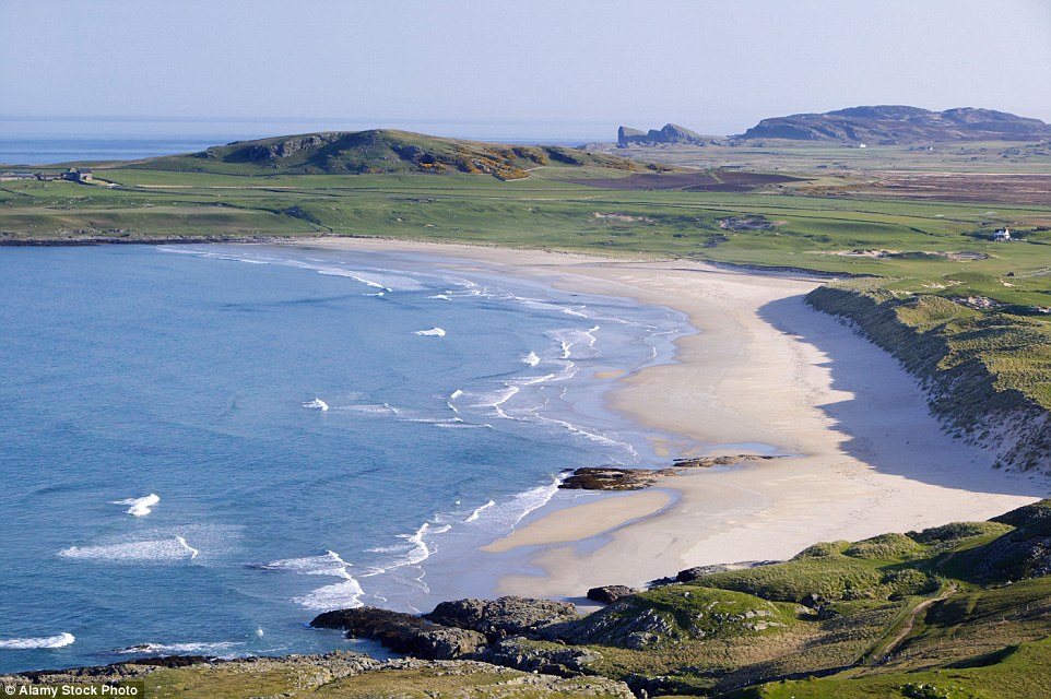 Islay is the southernmost island of the Inner Hebrides of Scotland. Pictured is Machir Bay, which is described by Scottish travel writer Robin McKelvie as 'a jaw dropping wildscape that curls around in a huge sweep of pristine sand'