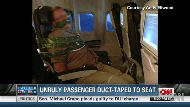 A photo of man a bound to his seat on an Iceland Air flight made social media rounds. The man, apparently inebriated, was hitting, screaming and spitting at other passengers, said the airline, adding that duct tape and plastic zip ties are standard protocol when restraining unruly passengers.