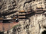 Out of place: The temple would blend into the cliff were it not for the elaborate and well-preserved traditional roof construction