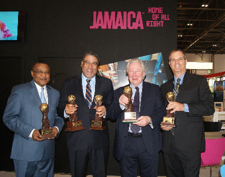 Jamaica copped an unprecedented five awards, courtesy of the prestigious World Travel Awards, including the Caribbean’s Leading Destination 2014 and Caribbean’s Leading Tourist Board 2014 while on the cruise front, Jamaica scooped three more awards. These were for Caribbean’s Leading Cruise Destination 2014, Caribbean’s Leading Cruise Port 2014 for Ocho Rios, and Caribbean’s Leading Heritage Attraction 2014 for Falmouth. Proudly displaying the clutch of awards are ( left to right) Director of Tourism, Paul Pennicook; Minister of Tourism and Entertainment, the Hon. Dr.Wykeham McNeill; World Travel Awards President Graham Cooke; and William Tatham, Vice President Cruise Shipping Marina Operations, Port Authority of Jamaica.