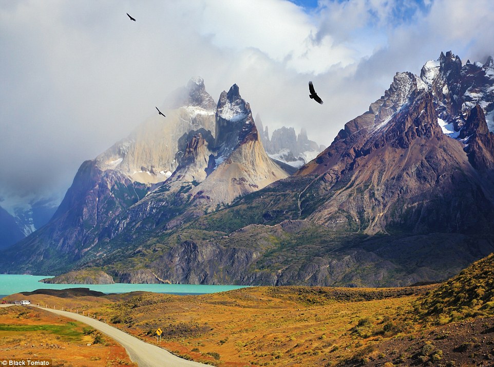 Starting in the icy peaks of Patagonia honeymooners can abseil, mountain bike, and white water raft their way through incredible landscapes. Pictured are the cliffs of Los Cuernos among the clouds, with Andean condors flying overhead