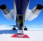 A White Desert client steps down onto Antarctica for the first timePatrick Woodhead   is the all action hero that should only exist in novels. In reality he is an explorer who writes these novels himself and is at the same time the man behind ?White Desert?, the world?s only travel company that offers luxury safaris to the Antarctic. Patrick and his team, which includes his wife Robyn, take small  groups  of  people  right  into  the  interior  of  the  world?s  southern  most continent. They fly these lucky few on specially chartered private jets to an ice runway in the middle of the Antarctic. At 59,000 euros for an eight-¿-day holiday, the trips inevitably cater for a who?s who of the world?s rich and famous. Some seeking exclusive access to one of earth?s remaining true wildernesses, some just an extraordinary adventure but all a chance to visit an amazing place and in the luxury  they  are  accustomed  to.  All  this  and  at  the  same  time  Patrick  is  a successful thriller