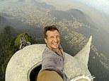 Travel company boss Lee Thompson was allowed to climb the 124ft-high Christ The Redeemer statue in Rio de Janeiro, taking a selfie as he reached the top