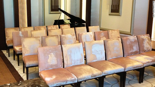 This is the bride's eye view in the Gold Chapel. Other venues within THEhotel at Mandalay Bay include the Swan Court, a lounge made of ice and a tunnel surrounded by 1.3 million gallons of seawater and 15 species of sharks.