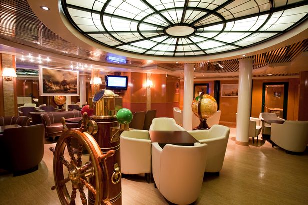 On board: Inside the cruise ship's Columbus Lounge Inside cruise ship