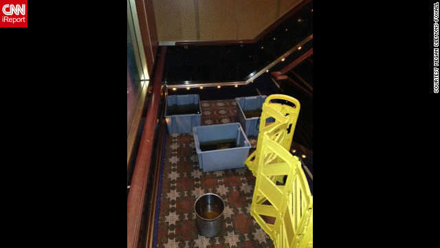 According to passenger Megan Clemons-Foxall these buckets of sewage rest in stairwell aboard the ship.