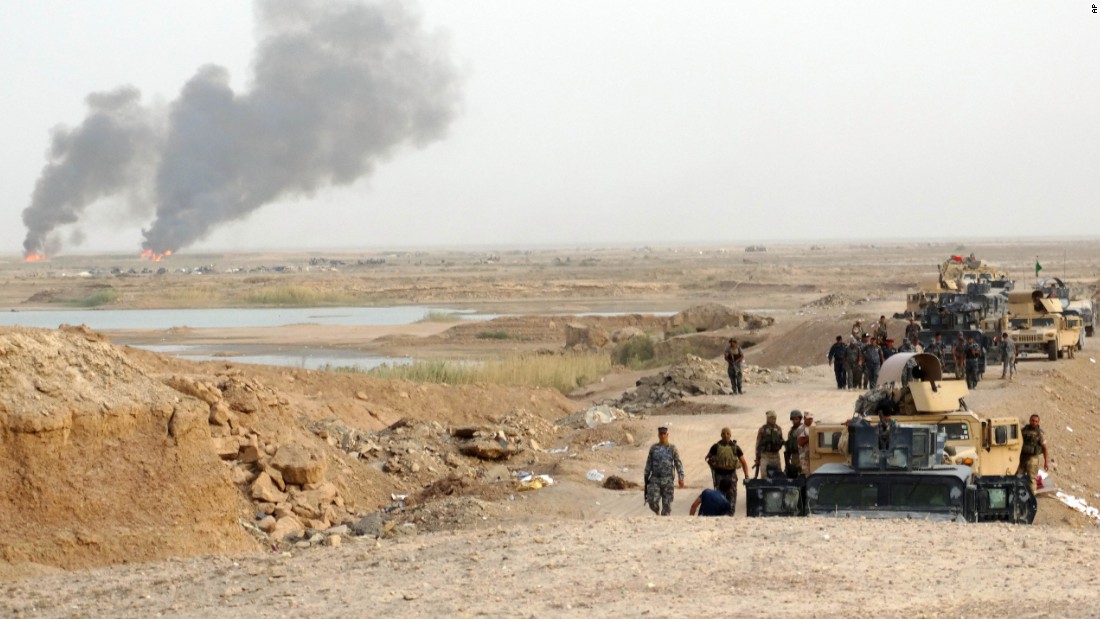 Smoke rises as Iraqi security forces bomb ISIS positions in the eastern suburbs of Ramadi, Iraq, on August 6. The city fell in May to ISIS, a militant group that wants to create an Islamic state across Sunni areas of Iraq and Syria. ISIS has also claimed responsibility for attacks in other countries in the Middle East.