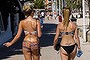 Tourist walks on the promenade at Magaluf beach on July 12, 2014 in Mallorca, Spain.