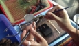 Manually embedding shell into the oyster to create a pearl