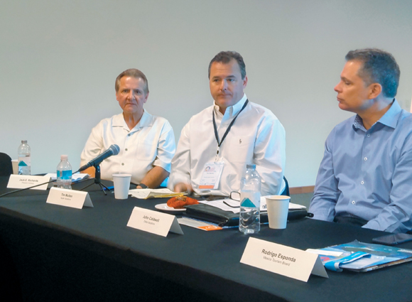 Jack E. Richards, Pleasant Holidays; Tim Mullen, Apple Vacations and John Caldwell, MLT Vacations