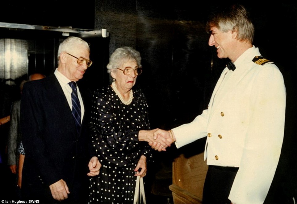 This elderly couple were less than thrilled to meet the captain of their ship, as evidenced by the woman's unhappy grimace