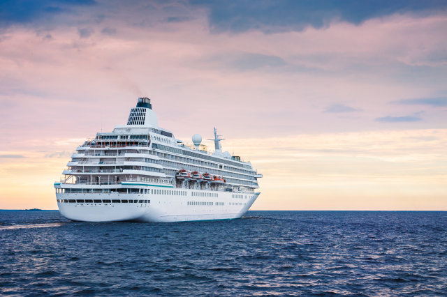 Big cruise ship in the sea at sunset. Beautiful seascape