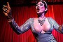 Indonesian drag queen Fiona performs during the 5th anniversary celebrations of Bali Joe Bar, one of the most famous gay bars in Bali on December 23, 2013 in Kuta, Indonesia. Transgender 'cabaret shows' are becoming increasingly popular in Bali's famous tourist district - Kuta. In the shows, drag queens appear with ornate costumes and perform a variety of shows to entertain the audience. Although there is no law against transgenders or homosexuality in Indonesia, discrimination is rife. 