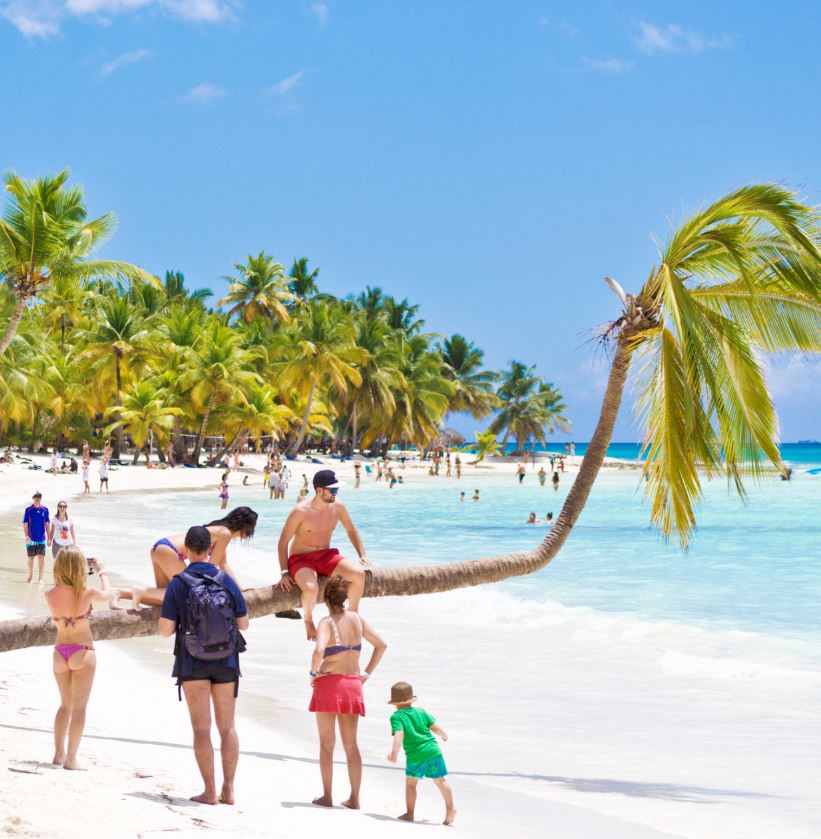 Dominican Republic Tourists walking on beach