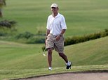 US President Barack Obama walks to 18th green as he plays golf at Mid-Pacific Country Club in Kailua, Hawaii, on January 1, 2014. The first family is in Hawaii for their annual winter vacation. AFP PHOTO/Jewel SAMAD        (Photo credit should read JEWEL SAMAD/AFP/Getty Images)