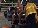 Scene: Emergency crews treat a scuba diver who was revived after being hit by lightning in Venice Beach on Sunday, July 27, 2014. Eights others were hit during the same storm