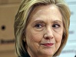 U.S. presidential candidate and former Secretary of State Hillary Clinton listens to small business owners as she campaigns for the 2016 Democratic presidential nomination at Capital City Fruit in Norfolk, Iowa April 15, 2015.  Clinton, who announced on Sunday that she is running for the 2016 Democratic presidential nomination, drove to Iowa to begin campaigning for president. REUTERS/Rick Wilking